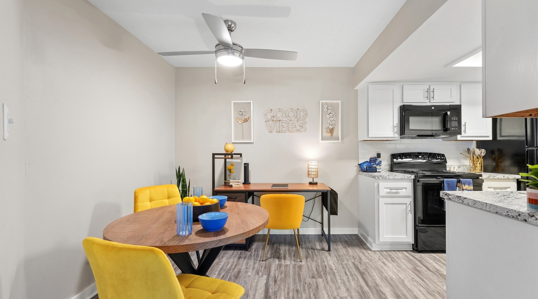 a kitchen with a dining room table